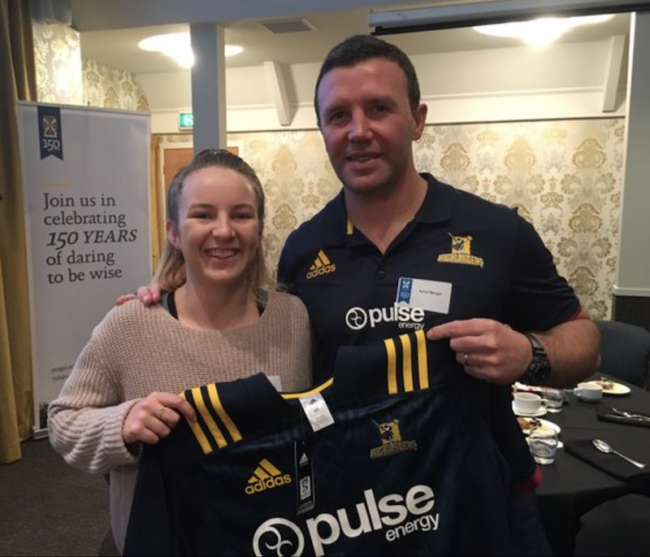 Johanna Leitch stands with Otago Rugby official.png