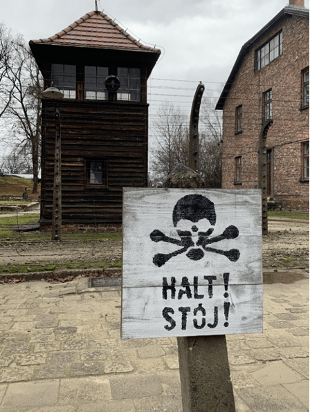 A sign at the Auschwitz concentration camp in Oświęcim, Poland, where over one million people died.