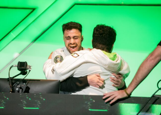 Dashy and iLLey celeberate on stage together after winning the Call of Duty Major I Championships
