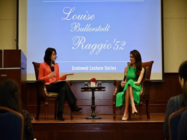 Professor Jenia Turner interviews Amal Clooney at Karcher Auditorium in front of an audience of law students.